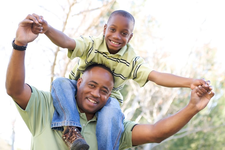 Man and Child Having Fun